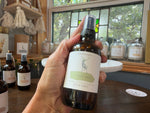 Cactus Milk room spray held in the Studio 1903 sunroom