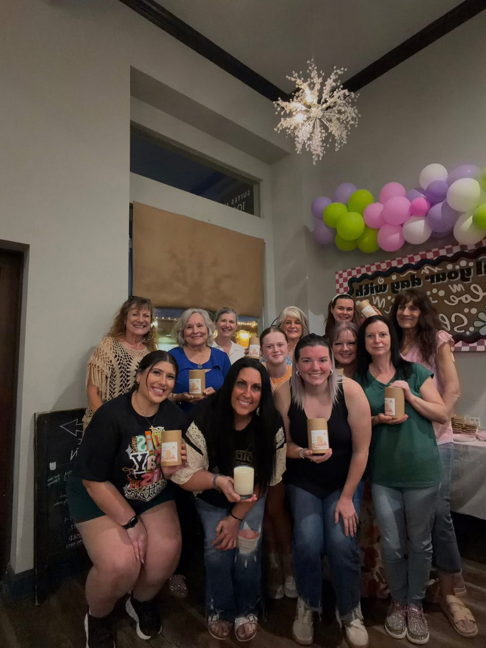 Celebration workshop group smiling with their candles