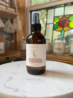 Front Deck room spray in amber glass bottle