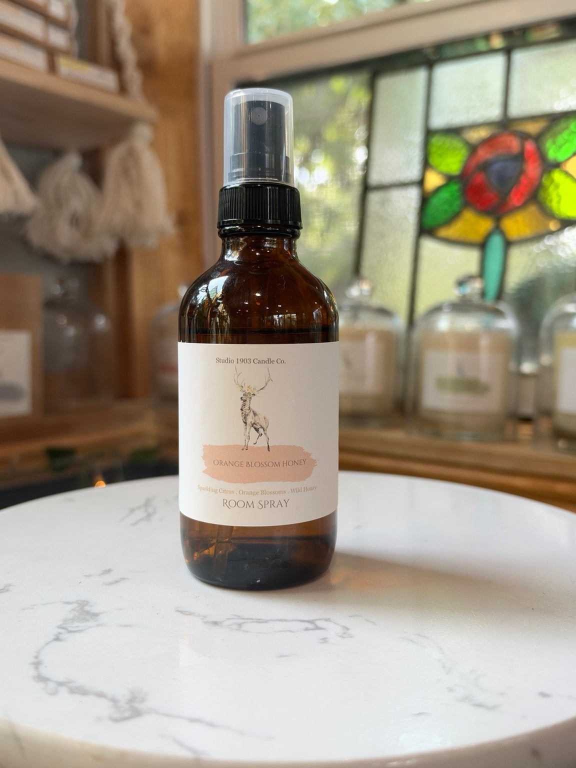 Orange Blossom Honey room spray in amber glass bottle